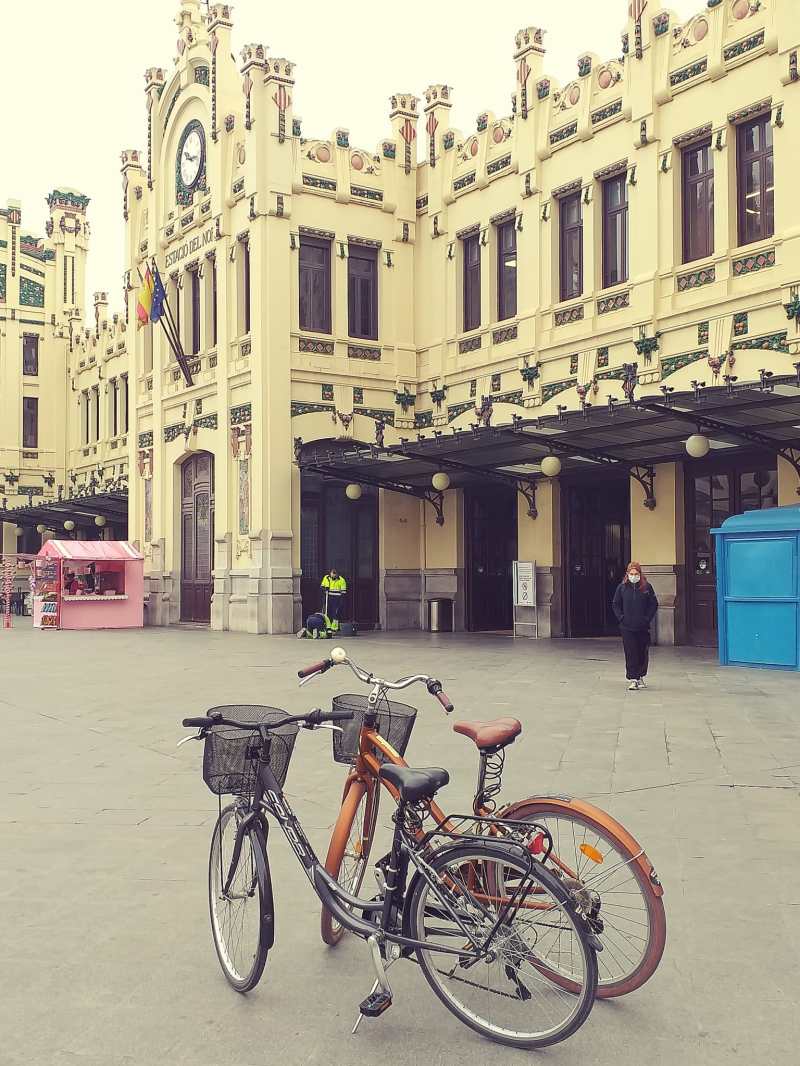 a bicycle parked in front of a building