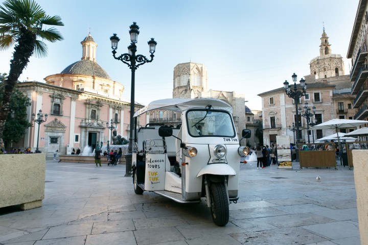 a truck is parked in front of a building